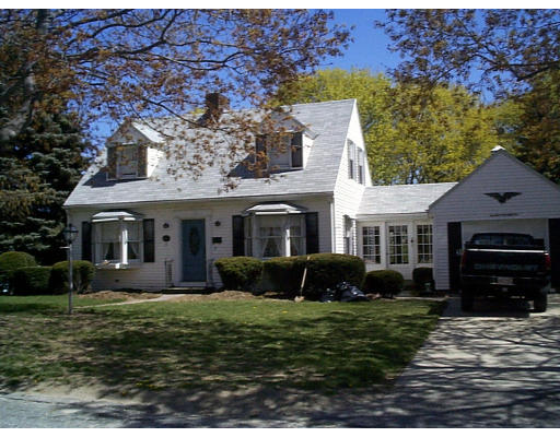 17 Rosenfeld Avenue Milford, MA 01757 - Photo 2 of 2 front view of a house with a garden