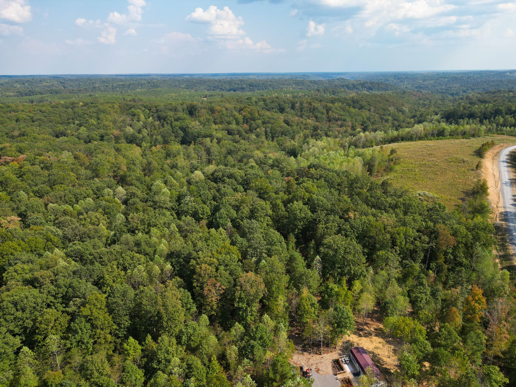 0 Amanda Road Dover, TN 37058 - Photo 6 of 26 an aerial view of residential houses with outdoor space and trees
