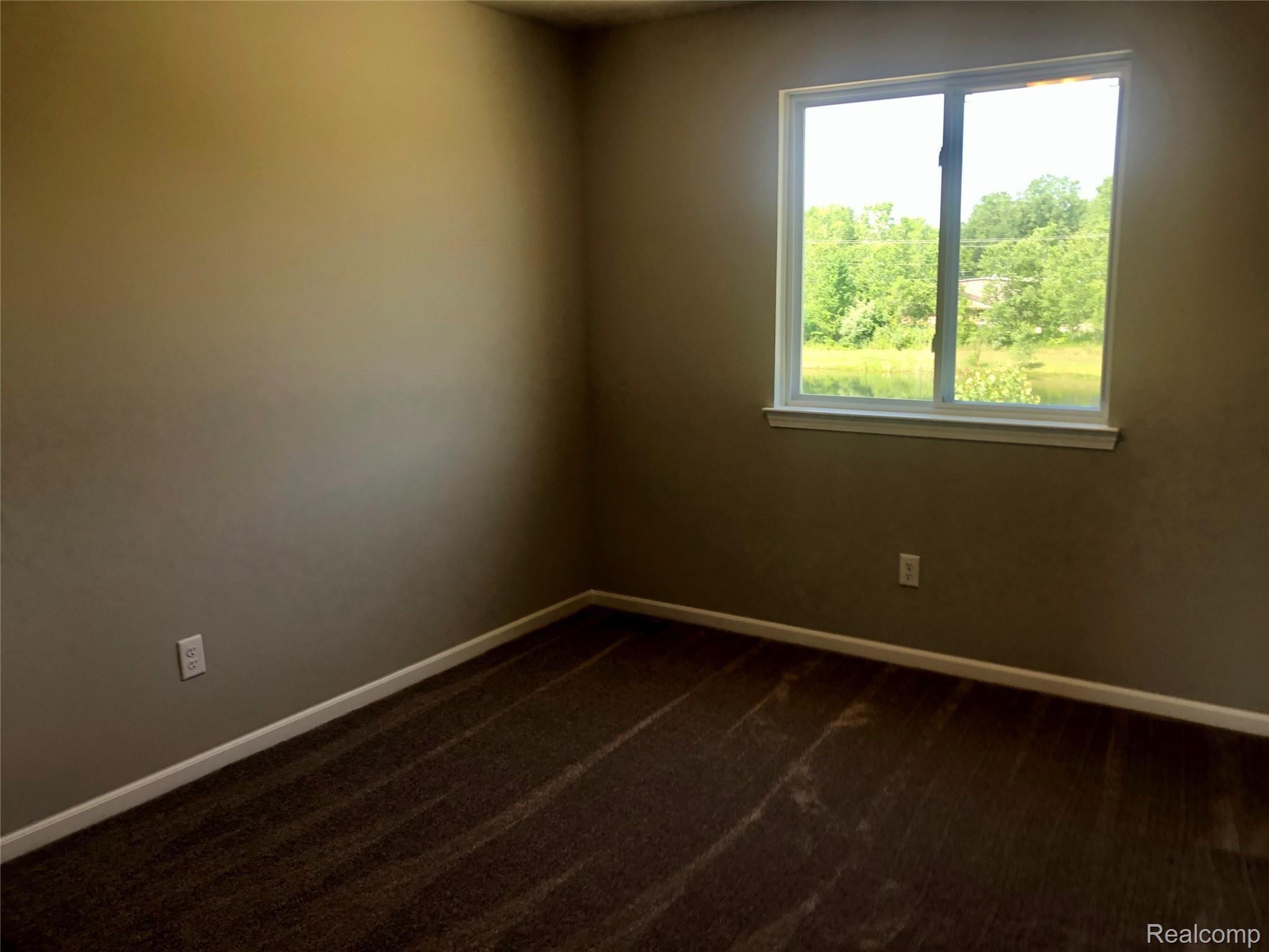 42845 Colonial Road Belleville, MI 48111 - Photo 20 of 21 Rear Corner Bedroom