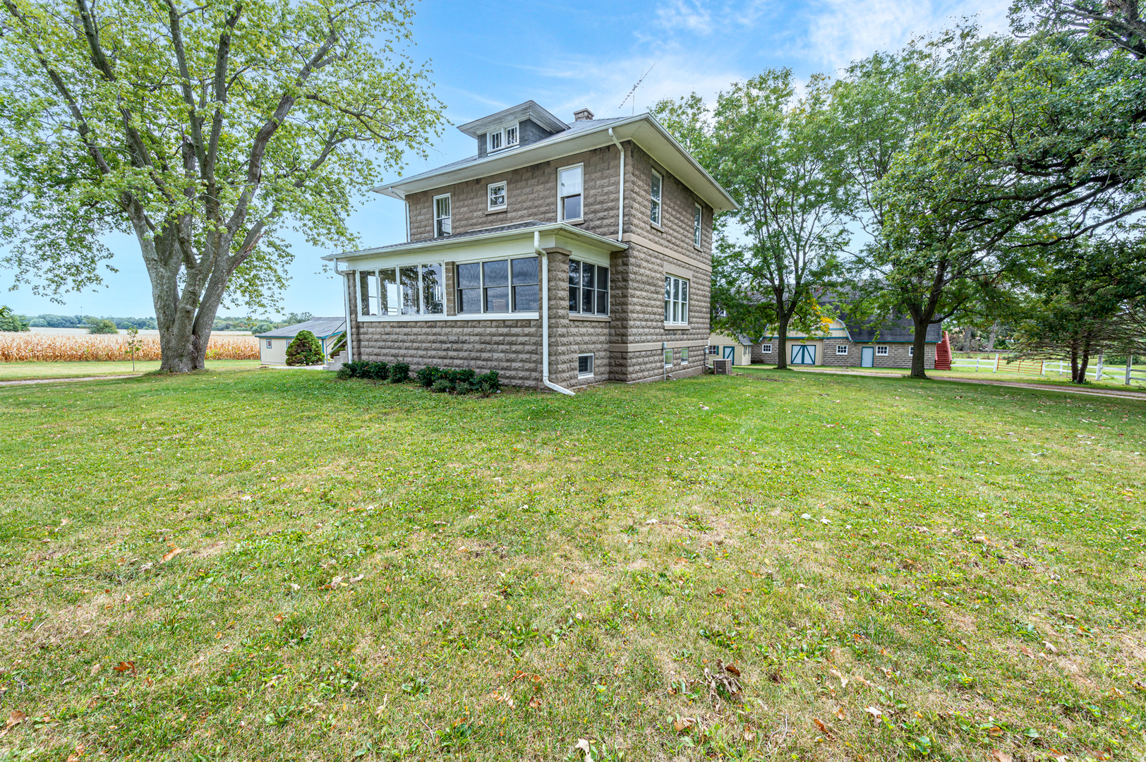 15346 Quigley Road Sycamore, IL 60178 - Photo 23 of 42 a view of a house with a yard