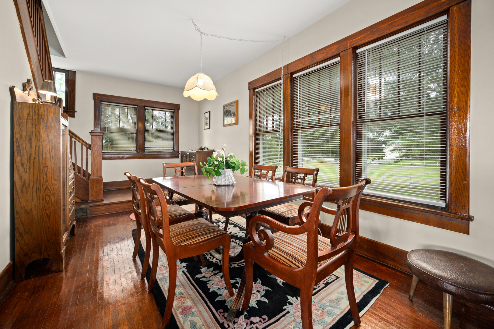 15346 Quigley Road Sycamore, IL 60178 - Photo 27 of 42 a view of a dining room with furniture window and wooden floor