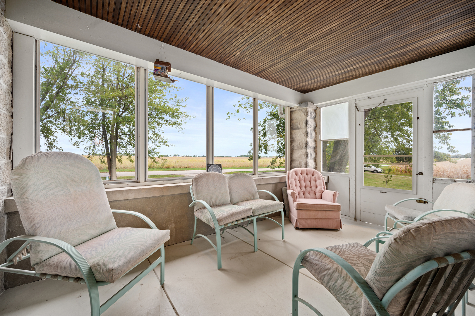 15346 Quigley Road Sycamore, IL 60178 - Photo 29 of 42 a living room with furniture and windows