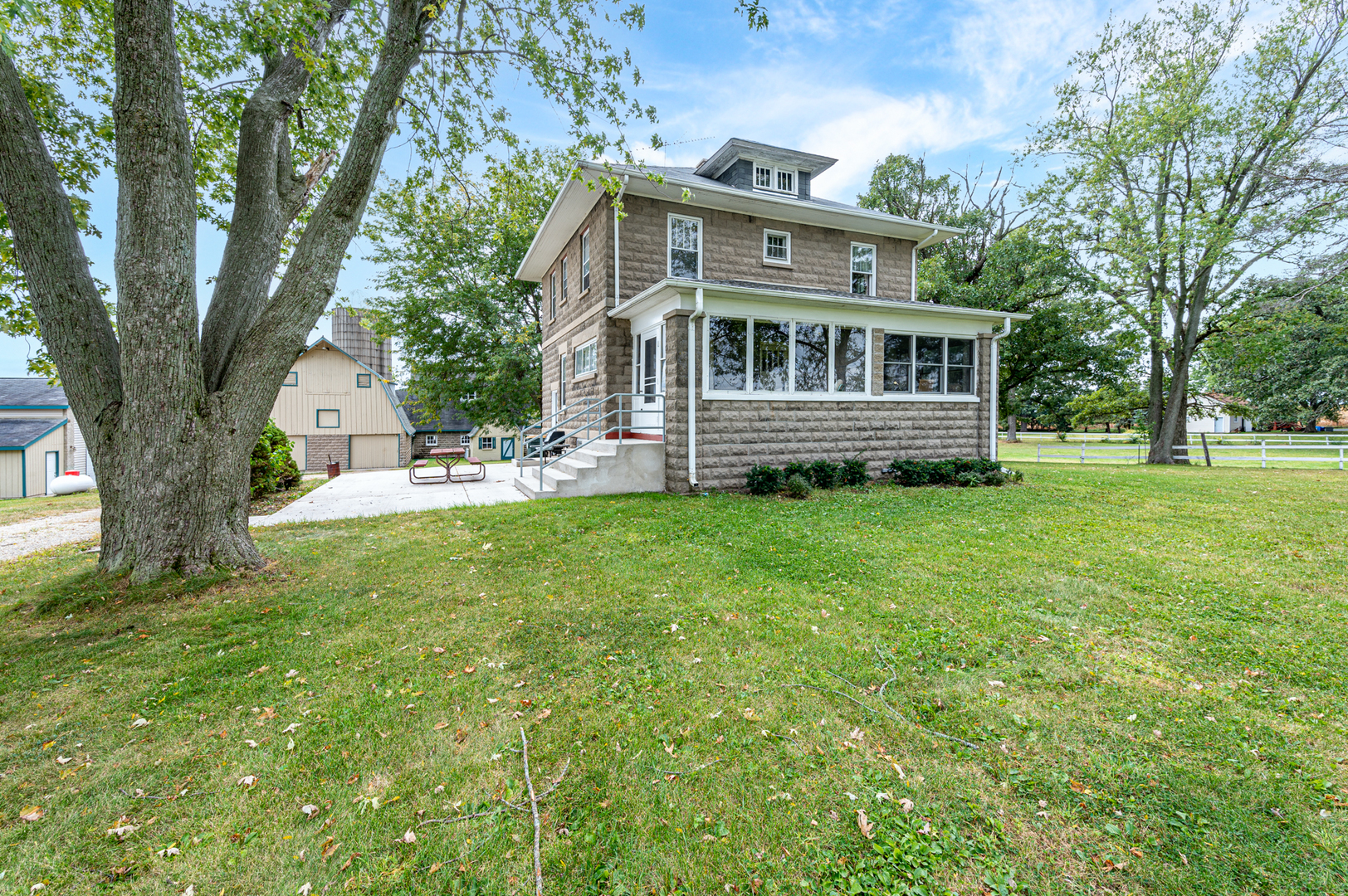 15346 Quigley Road Sycamore, IL 60178 - Photo 5 of 42 a view of house with a big yard