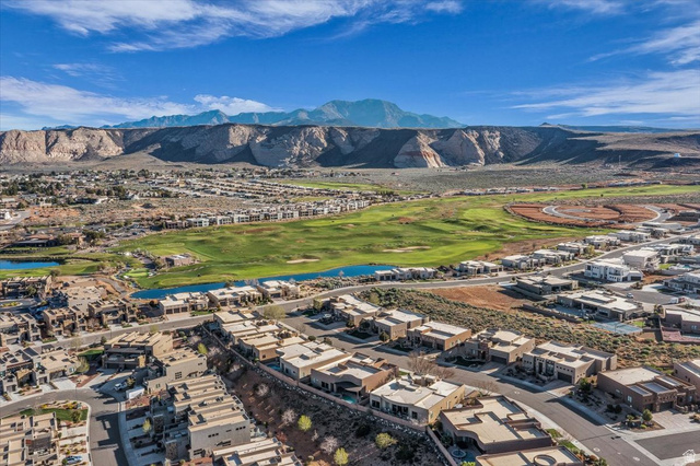 4796 Winged Foot Drive St. George, UT 84770 - Photo 8 of 33 Drone / aerial view of a water and mountain view and a golf course