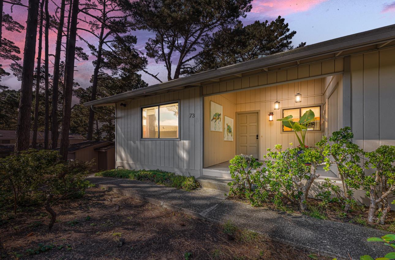 250 Forest Ridge Road, Unit 73 Monterey, CA 93940 - Photo 1 of 35 a front view of a house with garden