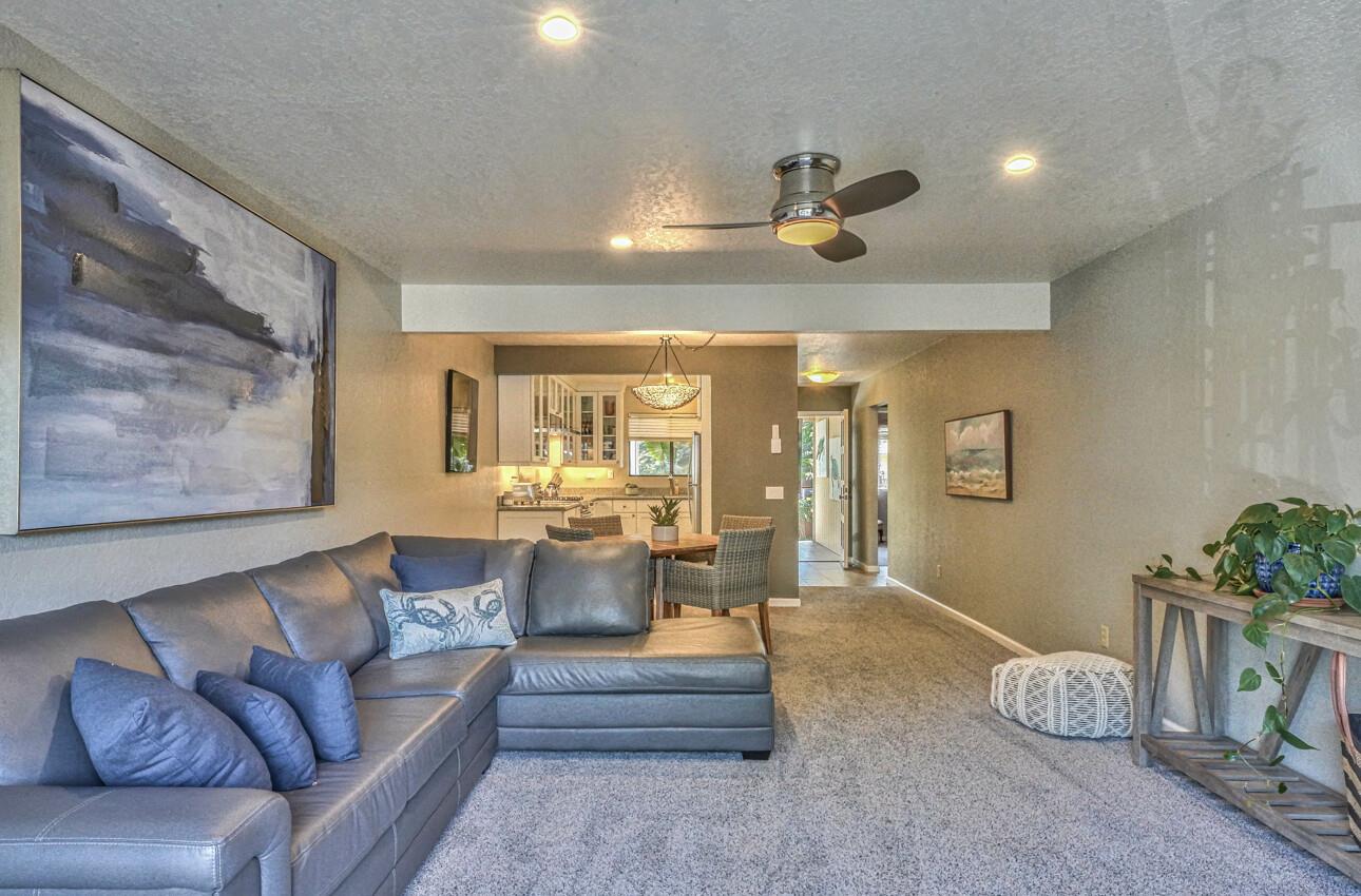 250 Forest Ridge Road, Unit 73 Monterey, CA 93940 - Photo 12 of 35 a living room with furniture flowerpot and window