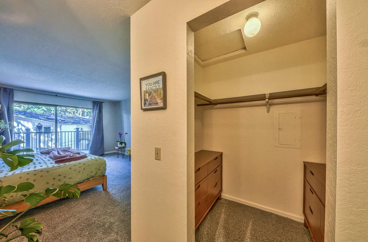 250 Forest Ridge Road, Unit 73 Monterey, CA 93940 - Photo 22 of 35 a bedroom with a bed and a window