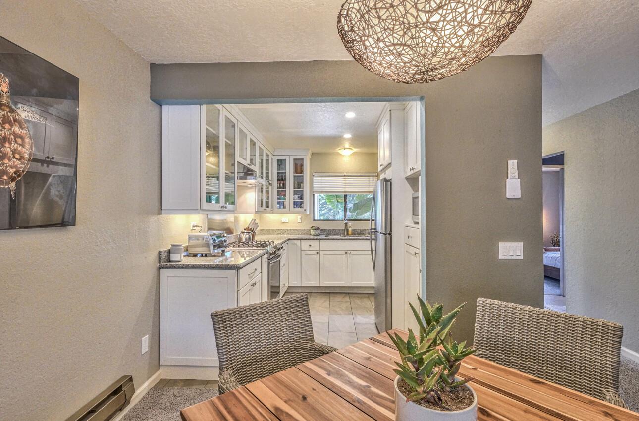 250 Forest Ridge Road, Unit 73 Monterey, CA 93940 - Photo 8 of 35 a living room with furniture and a potted plant