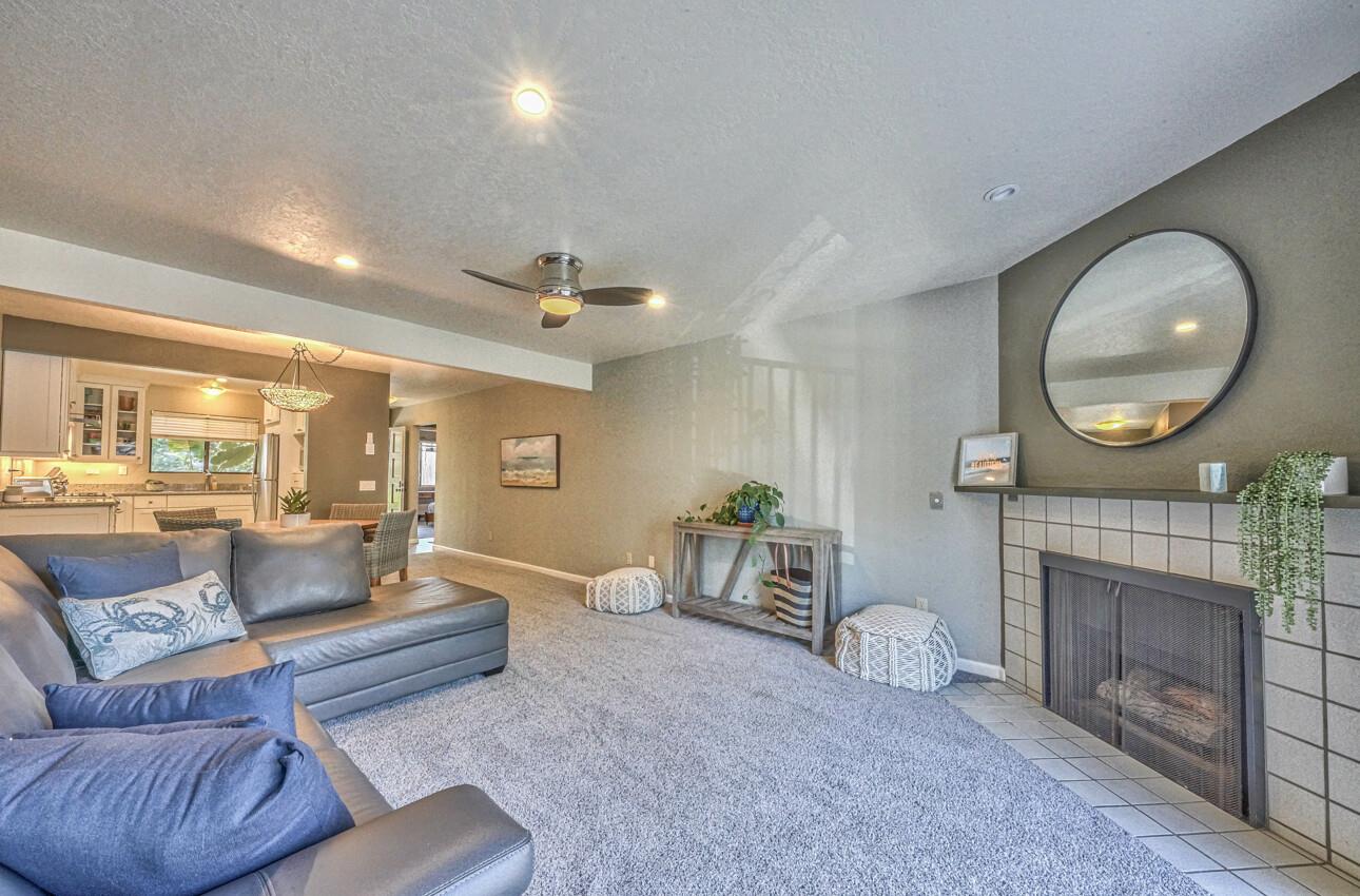 250 Forest Ridge Road, Unit 73 Monterey, CA 93940 - Photo 10 of 35 a living room with furniture and a fireplace