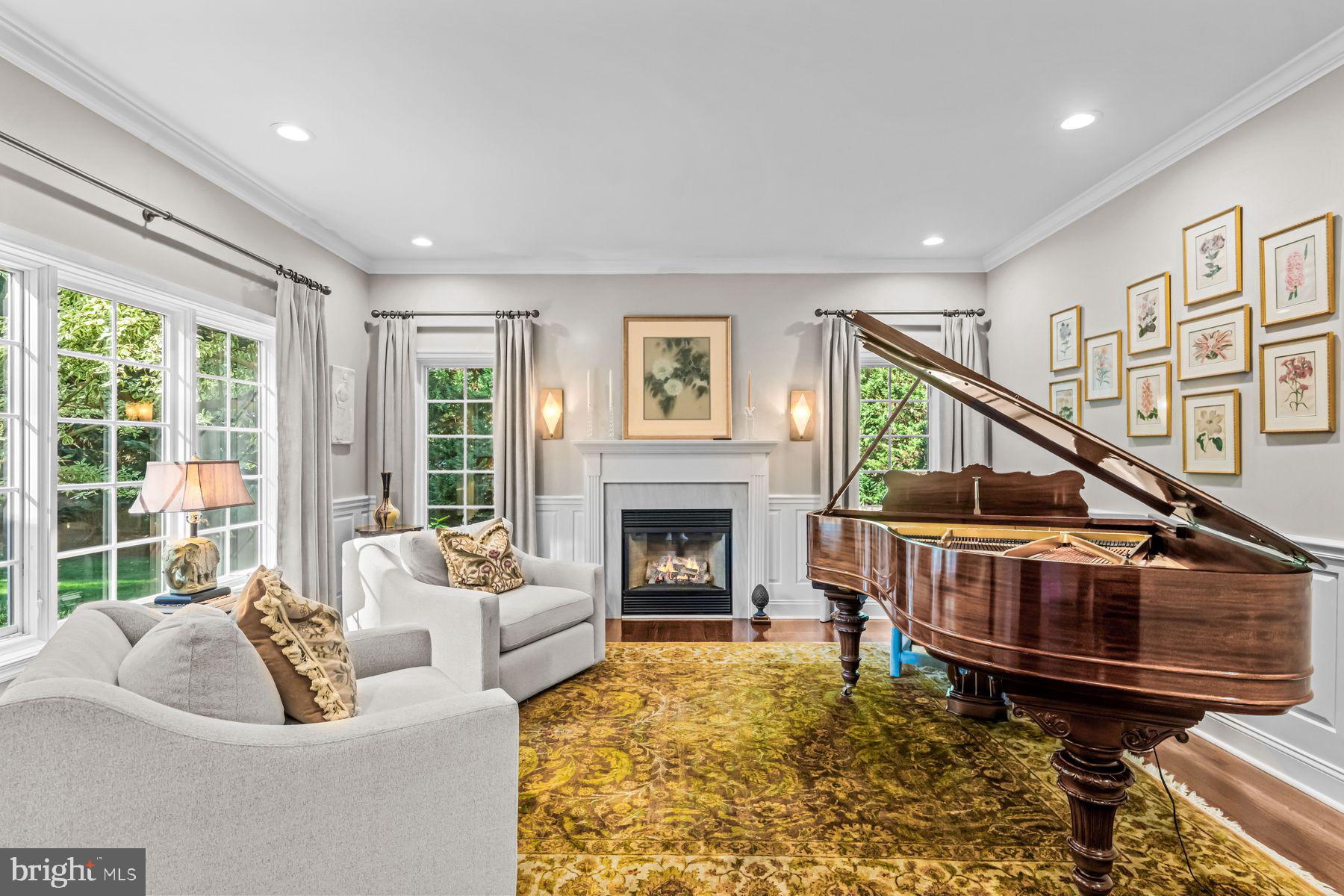623 Broad Acres Road Penn Valley, PA 19072 - Photo 15 of 78 a living room with furniture and a fireplace