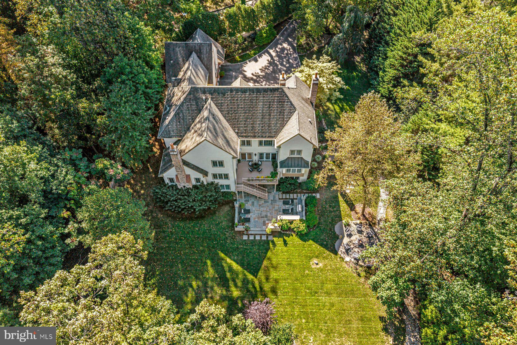 623 Broad Acres Road Penn Valley, PA 19072 - Photo 8 of 78 a aerial view of a house with a yard and large trees
