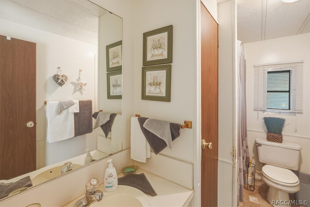 928 South Shad Terrace Inverness, FL 34450 - Photo 25 of 48 a bathroom with a toilet sink and shower