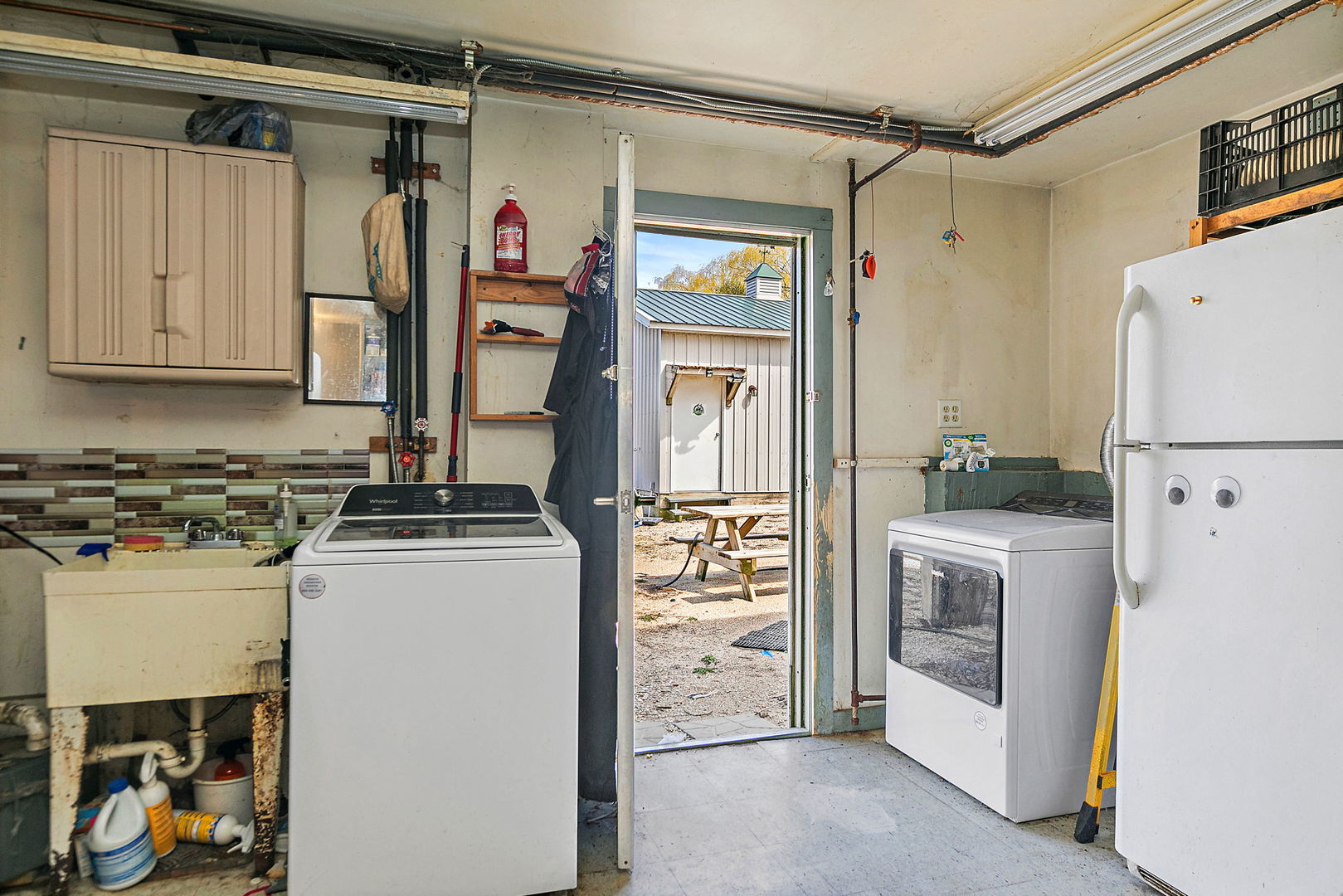 9602 Wright Road Harvard, IL 60033 - Photo 14 of 26 a kitchen with a refrigerator and a stove