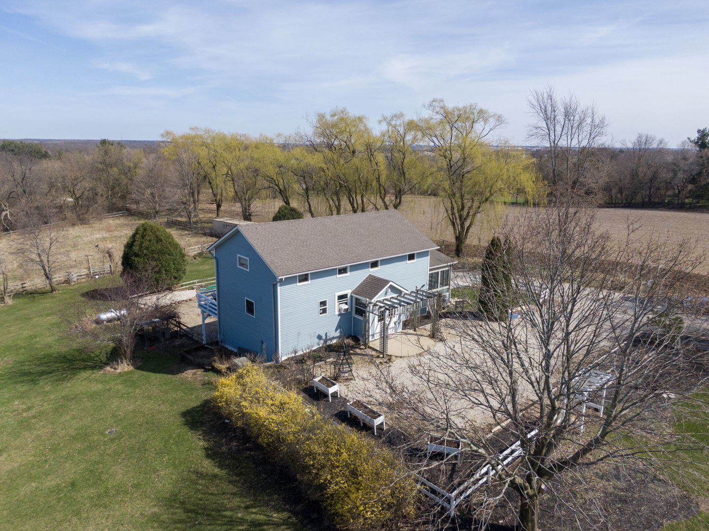 9602 Wright Road Harvard, IL 60033 - Photo 23 of 26 a view of a house with a yard