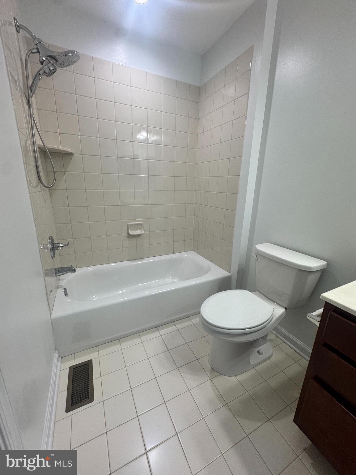 3313 Pietro Way Philadelphia, PA 19145 - Photo 7 of 16 a bathroom with a toilet a sink and shower