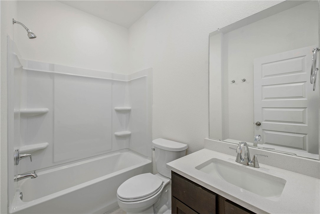 2799 Buccaneer Trail Bryan, TX 77803 - Photo 11 of 16 Photos depict previously completed Emily with elevation B. Selections and finishes may vary; please contact an RNL sales team for the latest information on this home.