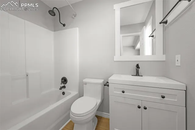 a bathroom with a sink a toilet and a bathtub