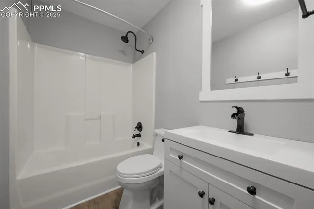 a bathroom with a sink a toilet and a bathtub