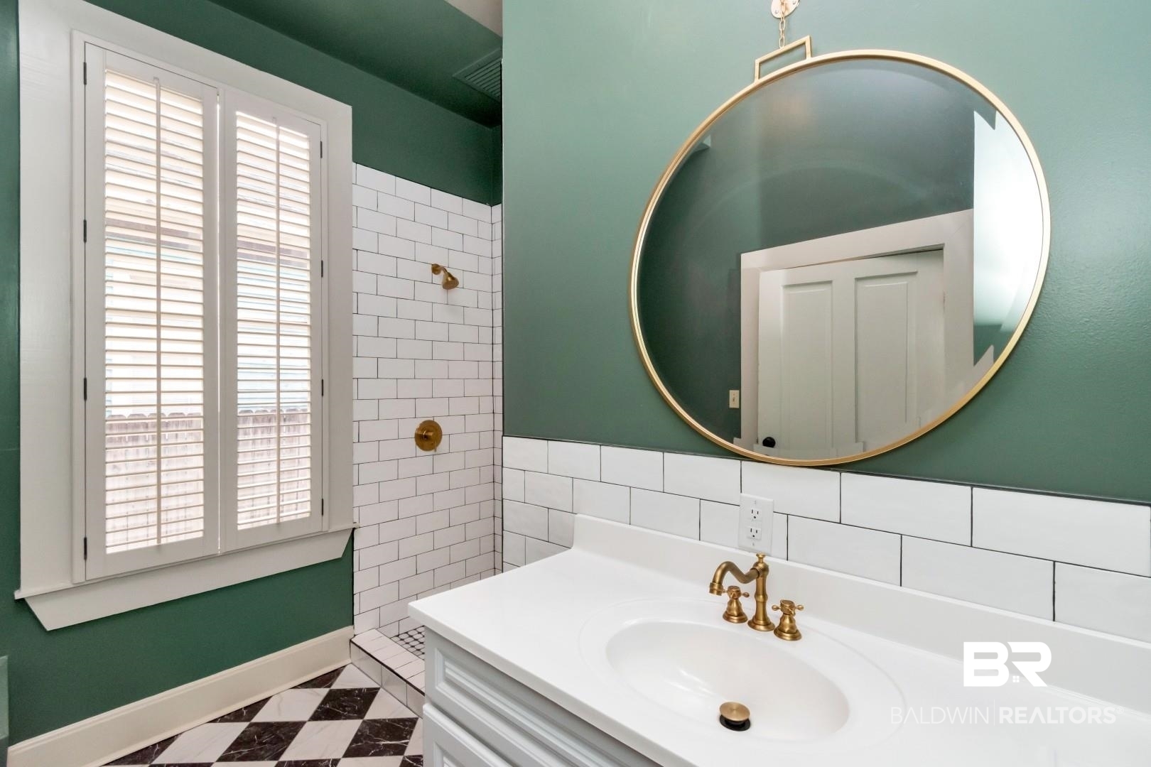 605 St Francis Street Mobile, AL 36602 - Photo 16 of 40 Full bath with vanity, tile patterned floors, and a tile shower