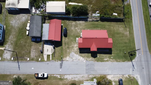 a front view of a house with yard