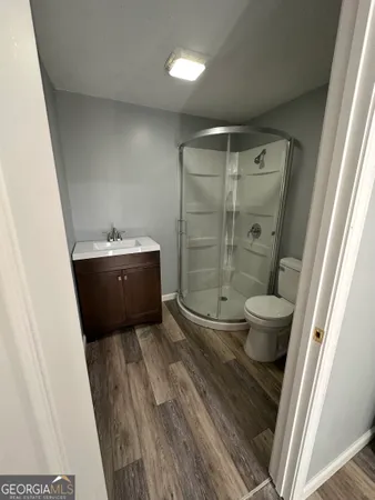 a bathroom with a sink and mirror