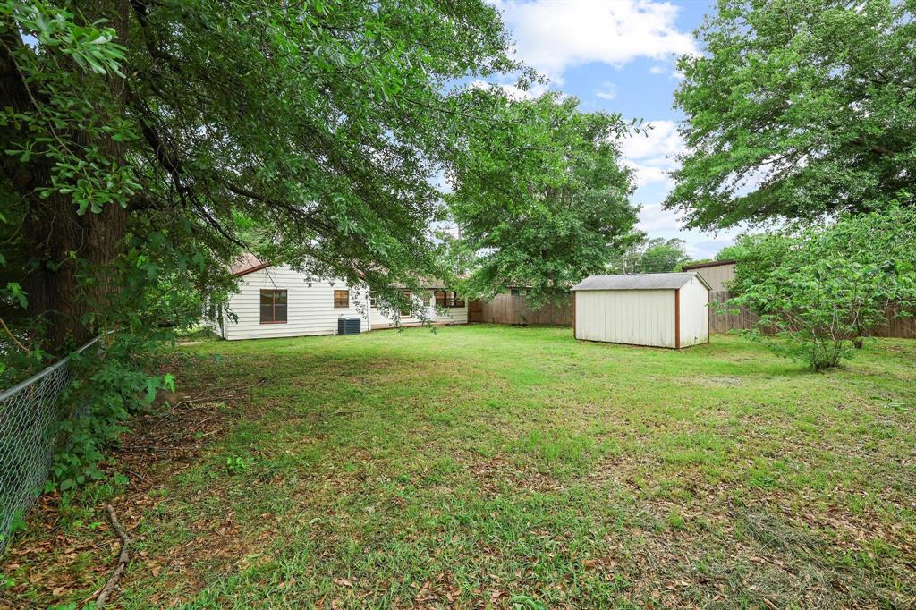 2401 Sunset Street Denison, TX 75020 - Photo 30 of 30 a view of a house with a yard