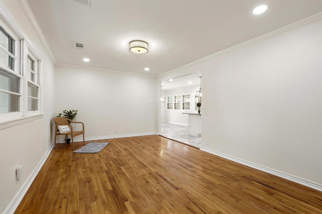 2401 Sunset Street Denison, TX 75020 - Photo 5 of 30 a view of empty room with wooden floor
