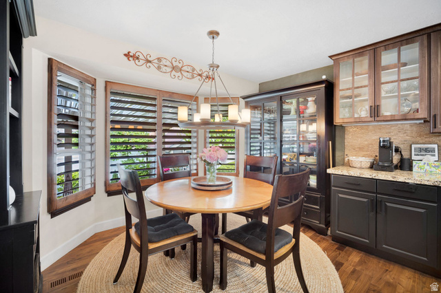 2139 Village Point Way Sandy, UT 84093 - Photo 11 of 35 Dining area looking out into beautiful backyard.