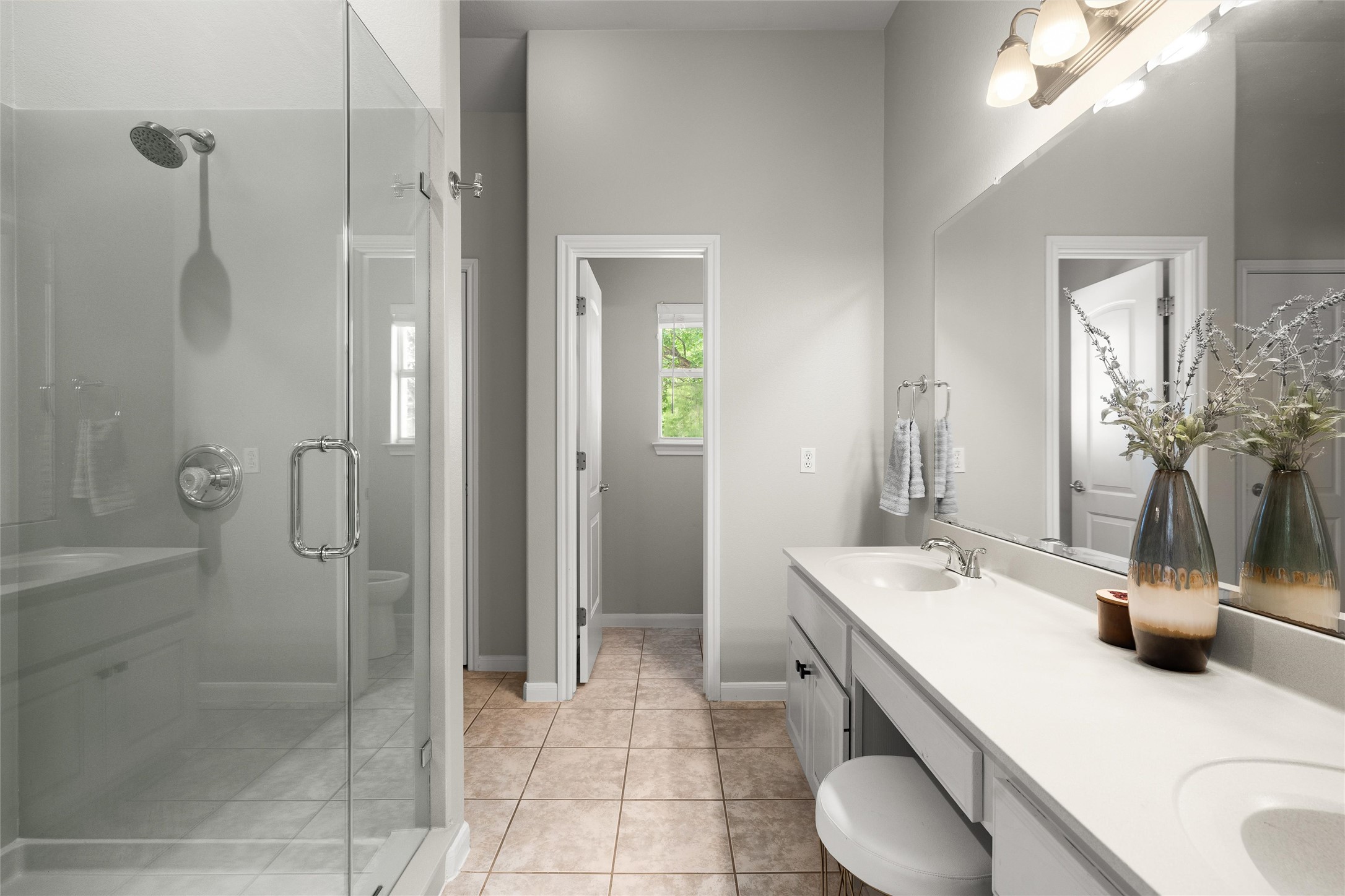 100 Stratton Court Austin, TX 78737 - Photo 20 of 38 Bathroom has been updated with refinished counters and shower plus a new glass shower door.