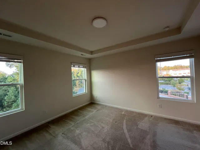 a bathroom with a double vanity sink toilet and shower