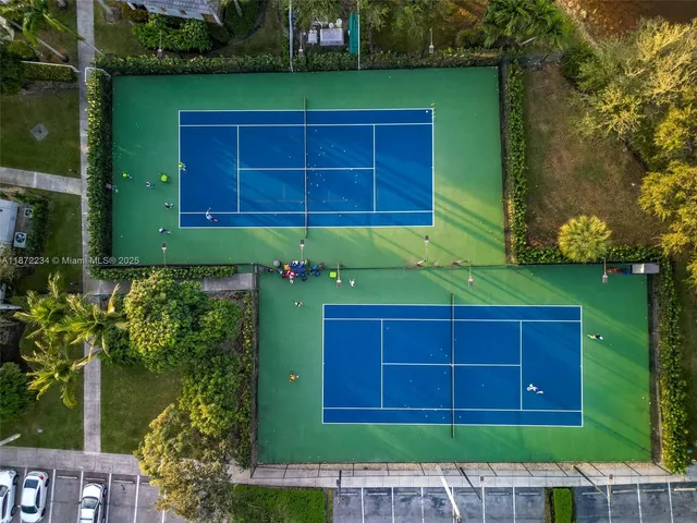 a view of front of a house with a garden