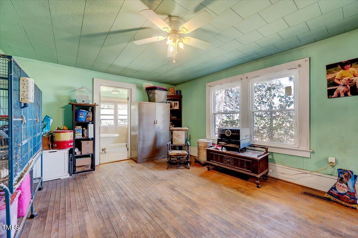 290 Collie Road Castalia, NC 27816 - Photo 5 of 61 a living room with furniture gym equipment and a large window