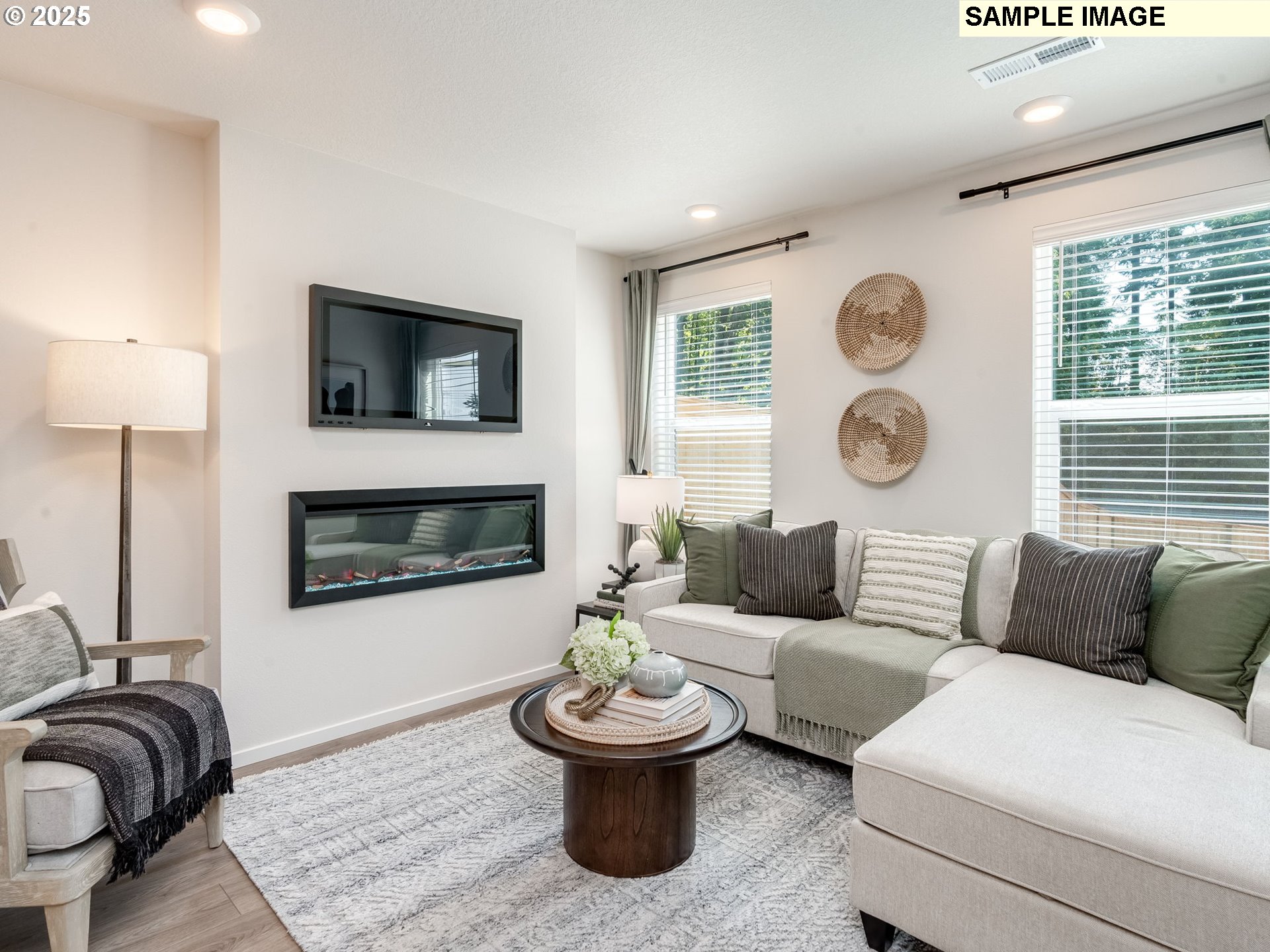 11203 Southeast 19th Street Vancouver, WA 98664 - Photo 14 of 30 a living room with furniture and a fireplace