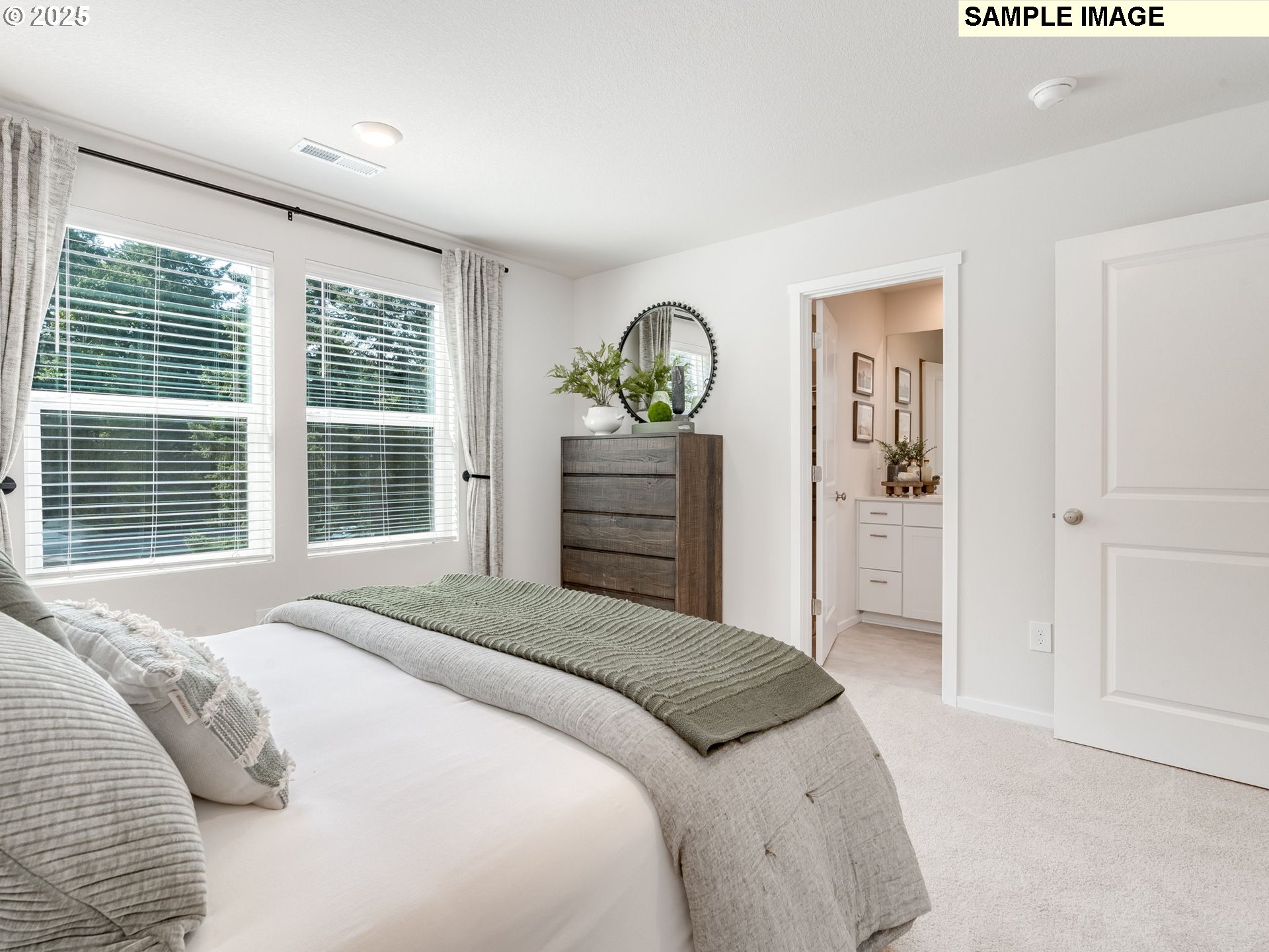 11203 Southeast 19th Street Vancouver, WA 98664 - Photo 19 of 30 a bedroom with a bed and a dresser