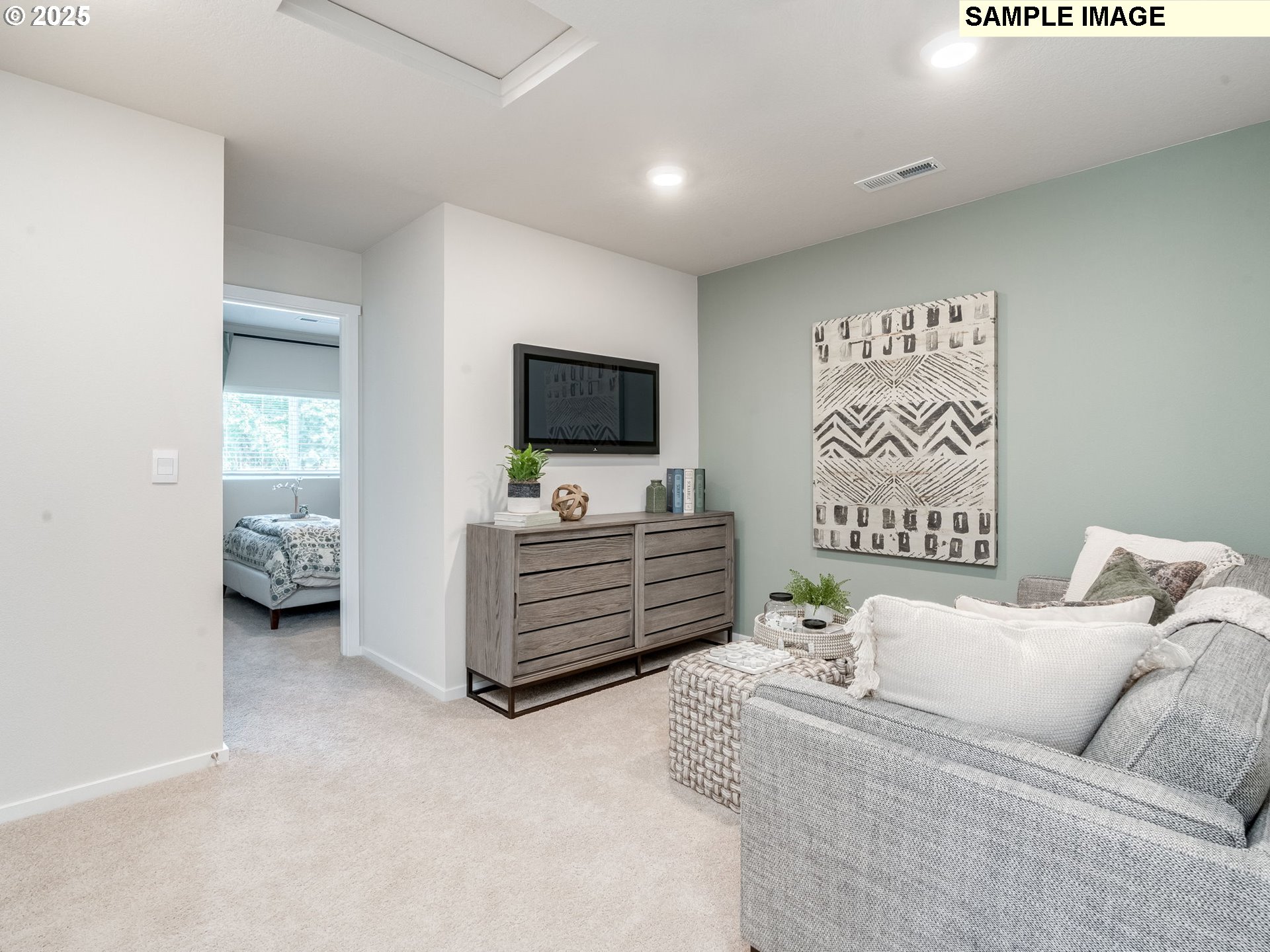 11203 Southeast 19th Street Vancouver, WA 98664 - Photo 24 of 30 a living room with furniture and a flat screen tv