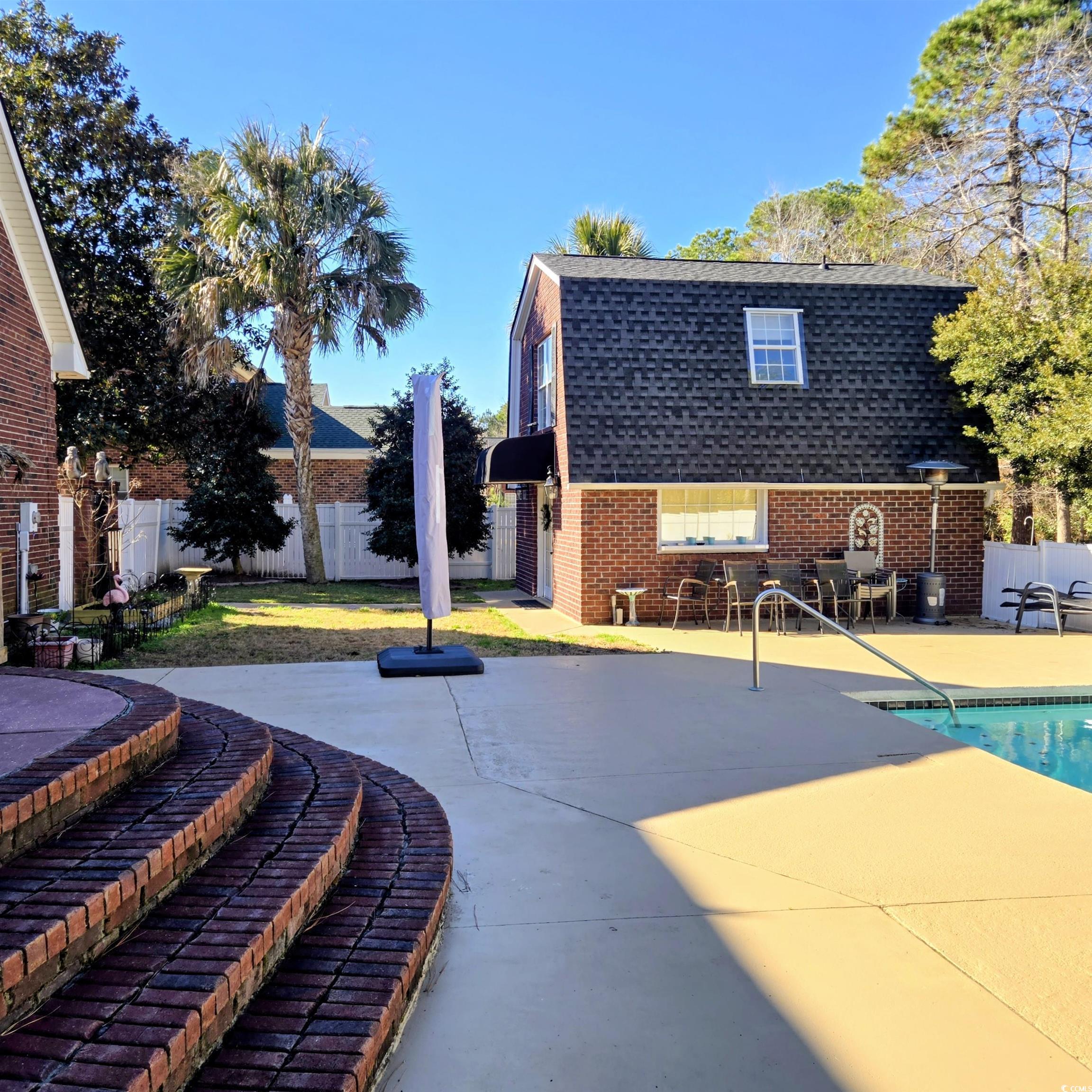 2410 Hunters Trail Myrtle Beach, SC 29588 - Photo 29 of 35 View of swimming pool featuring a patio area
