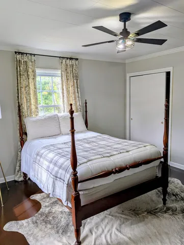 a view of an empty room with a white house