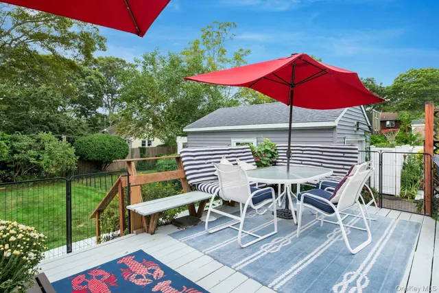 a backyard of a house with seating space