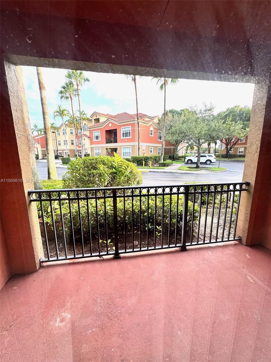 4402 Southwest 160th Avenue, Unit 910 Miramar, FL 33027 - Photo 14 of 22 a view of balcony with furniture