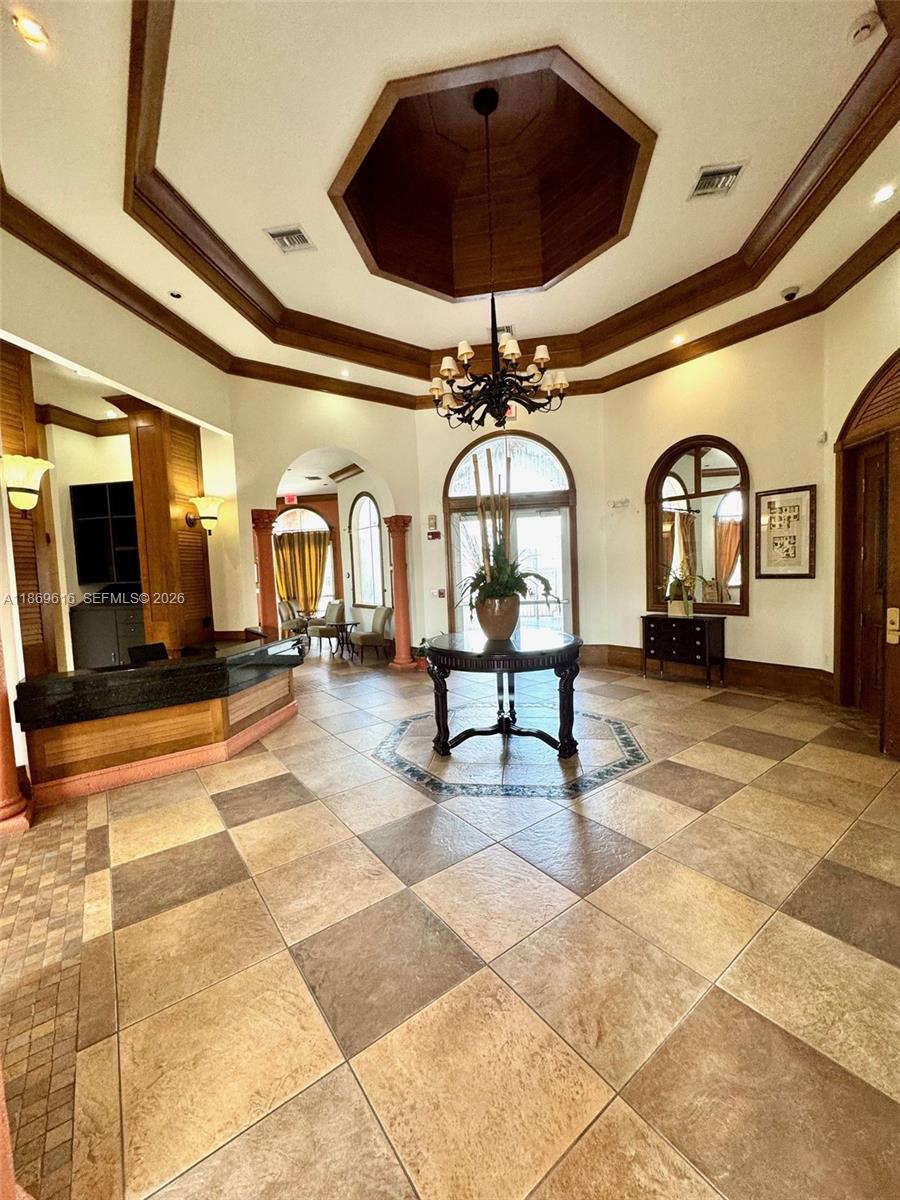 4402 Southwest 160th Avenue, Unit 910 Miramar, FL 33027 - Photo 16 of 22 a living room with furniture and a ceiling fan