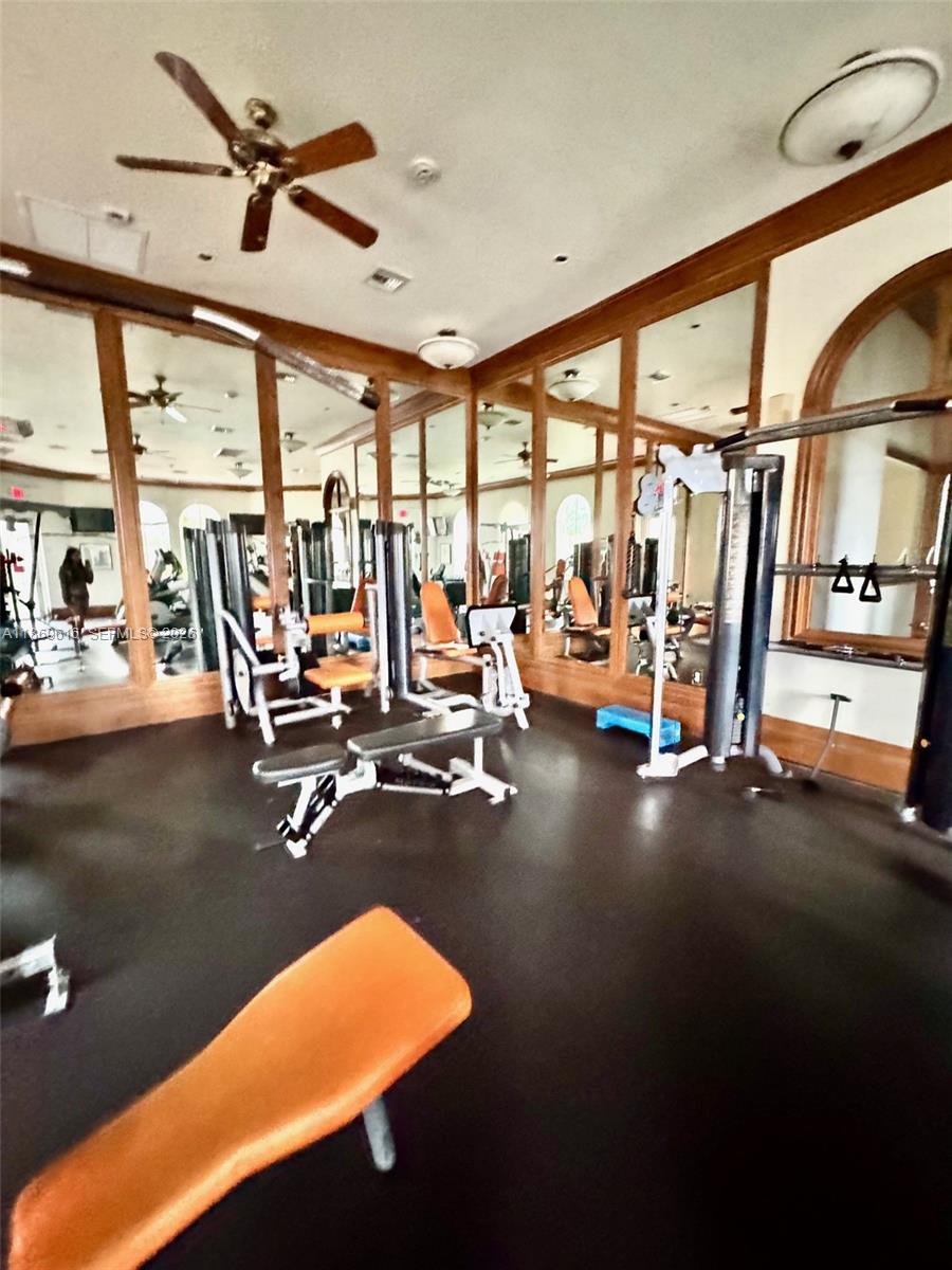 4402 Southwest 160th Avenue, Unit 910 Miramar, FL 33027 - Photo 21 of 22 a view of a room with gym equipment