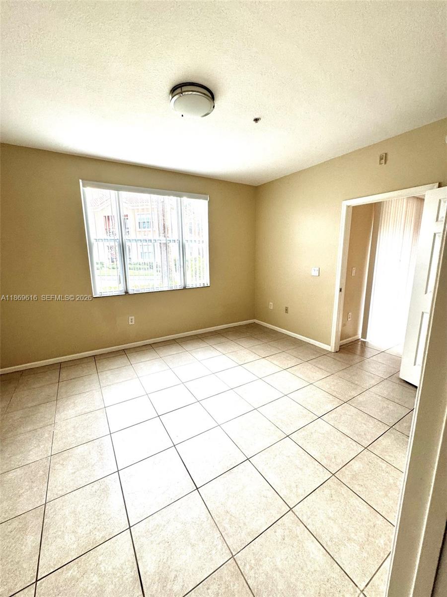 4402 Southwest 160th Avenue, Unit 910 Miramar, FL 33027 - Photo 7 of 22 a view of empty room