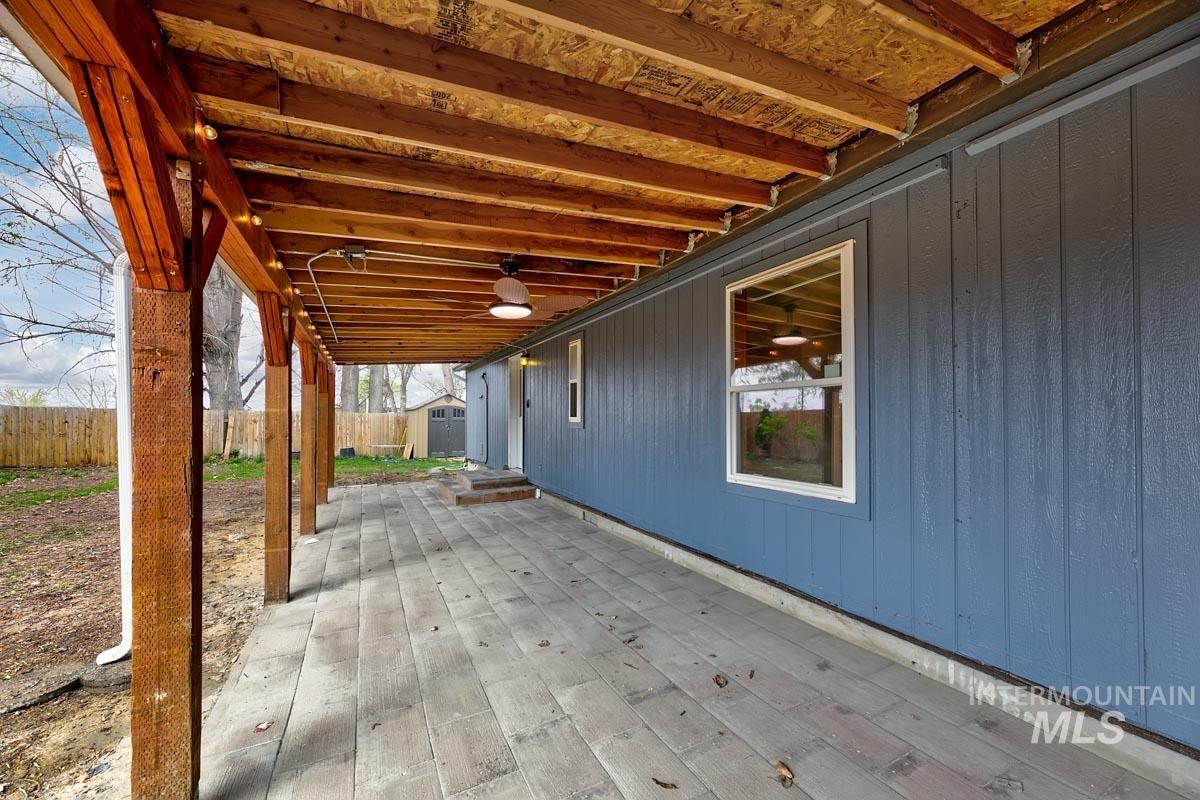 10131 Highway 44 Middleton, ID 83644 - Photo 23 of 42 Deck with a patio area and a storage shed