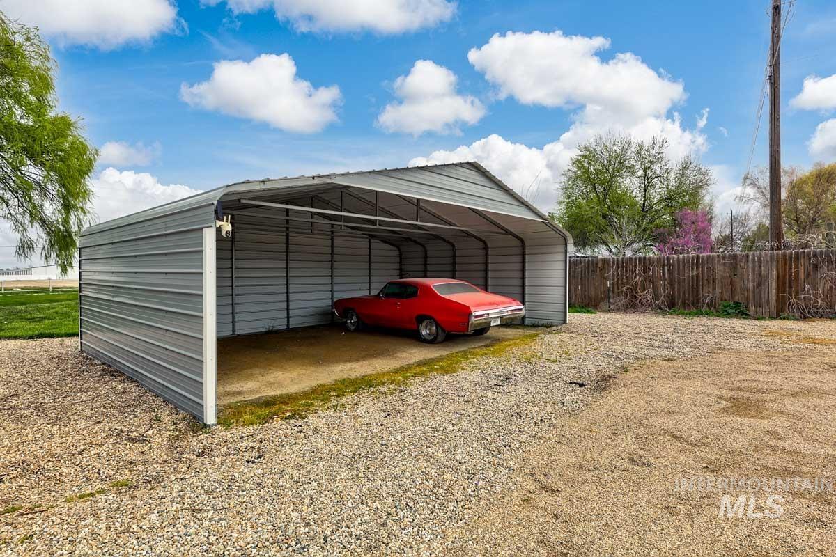 10131 Highway 44 Middleton, ID 83644 - Photo 4 of 42 View of parking with a detached carport and driveway