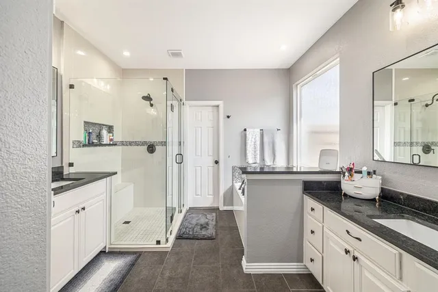 a kitchen with a sink stove and refrigerator