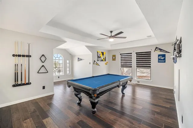 a room with furniture and wooden floor