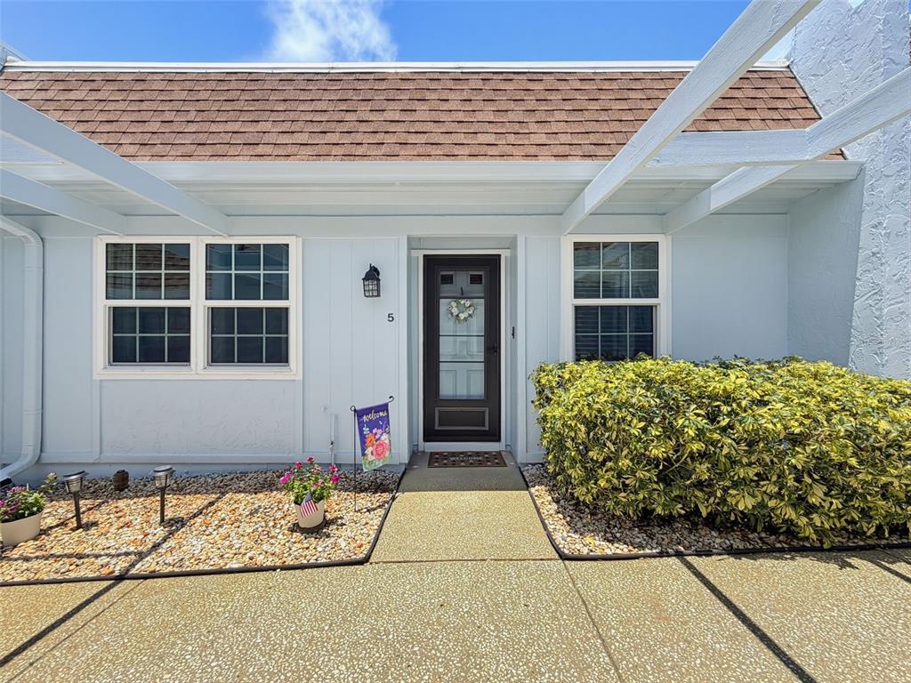 8220 7 Oaks Court, Unit 5 Port Richey, FL 34668 - Photo 1 of 22