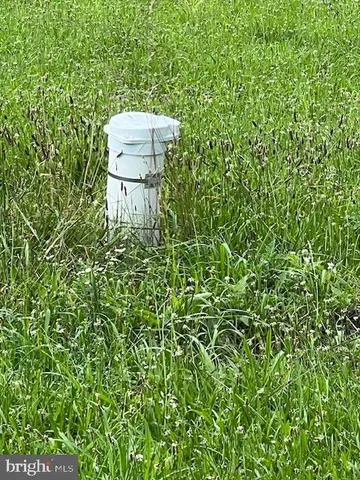 a balcony with a sink and mirror