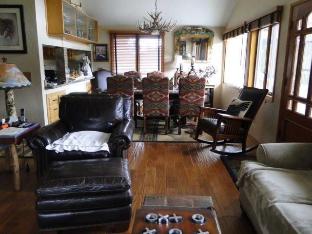 2000 Limpy Creek Road Grants Pass, OR 97527 - Photo 10 of 35 a living room with furniture fireplace and flat screen tv