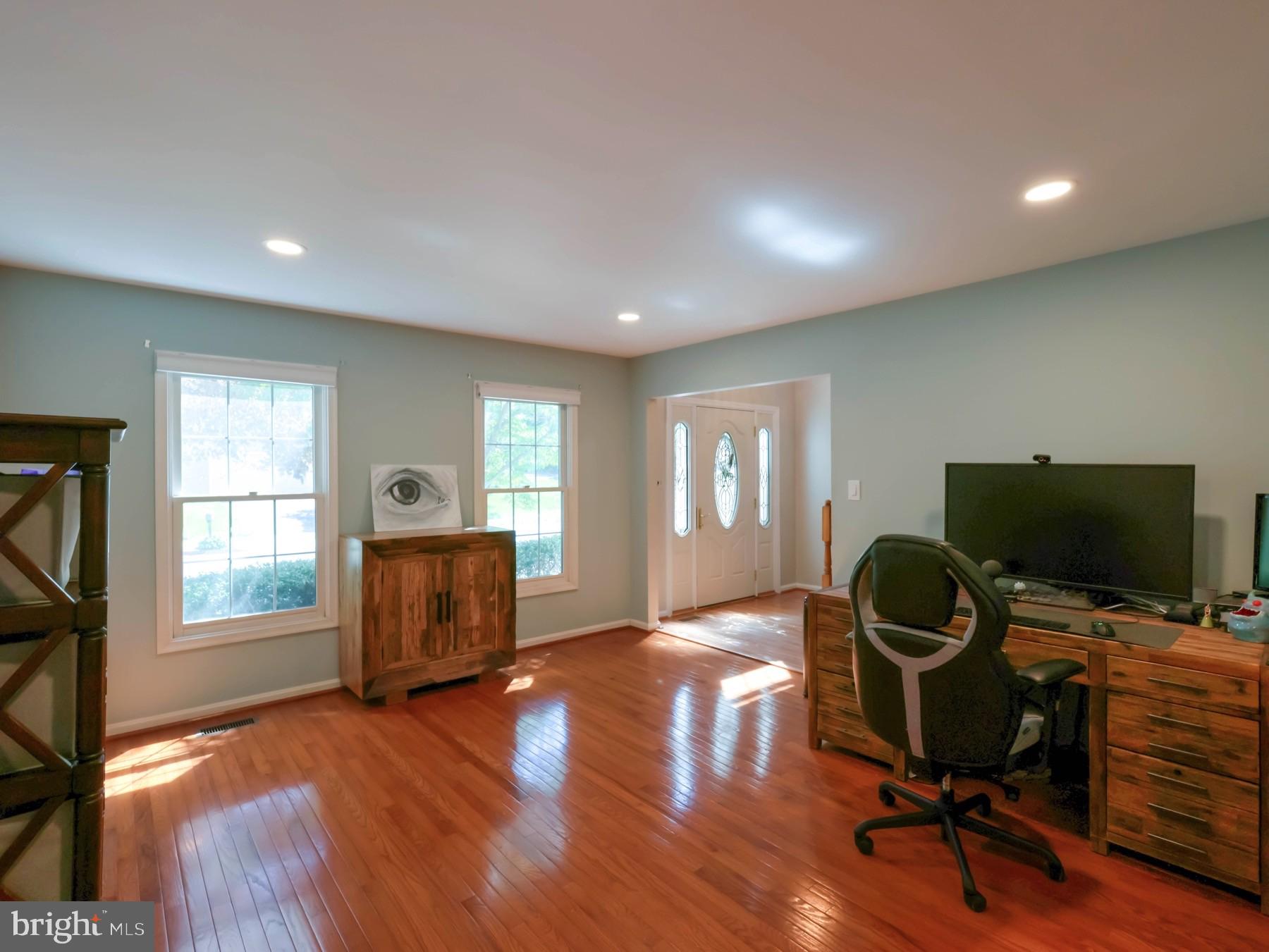18500 Gingerbread Lane Gaithersburg, MD 20877 - Photo 11 of 56 a view of workspace with wooden floor and windows